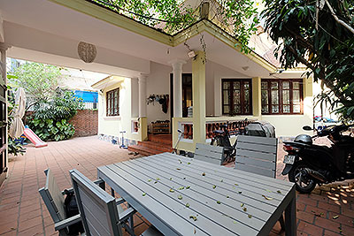 Large courtyard & Partly furnished house in Tay Ho to rent