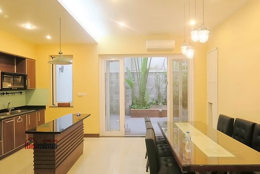 Semi furnished 03 bedroom house to let in Hai Ba Trung with nice courtyard 12