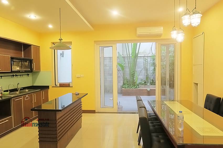 Semi furnished 03 bedroom house to let in Hai Ba Trung with nice courtyard 15