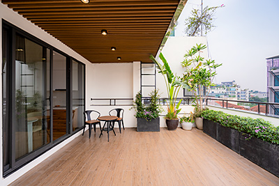 Top floor one-bedroom apartment on To Ngoc Van street, huge terrace
